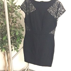 Black dress with lace short sleeve arms. Large